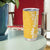 Puakenikeni and Maile Lei Tumbler Cup Gold Double Strand Lei