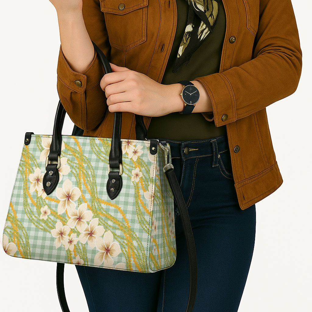 Liko Kukui Hawai'i Palaka Plumeria Leather Bag Puakenikeni and Maile Lei LT9 - Polynesian Pride