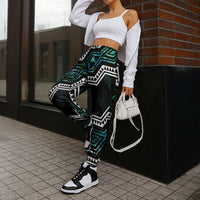 Taniko Aotearoa Mix Paua Shell Jogger Pants Niho Taniwha Turquoise Glitter - Polynesian Pride